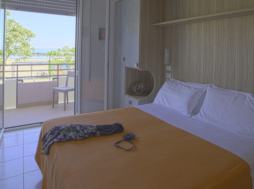 Camera viola Hotel Ridens
